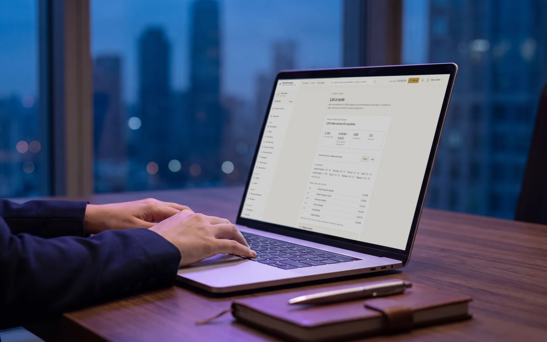 Hands on a laptop keyboard while PacketExchange reads an uploaded rate sheet and shows the rates, countries and destinations it will list